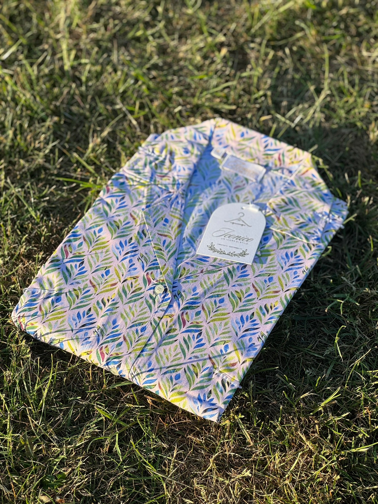 Serene Thread’s white linen button-up with multi-colored watercolor leaf pattern – Iconico Canopy