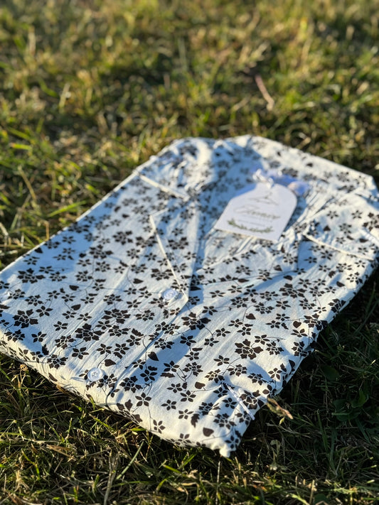 Elegant white linen dress with bold black floral design – Iconico Blossom by Serene Thread