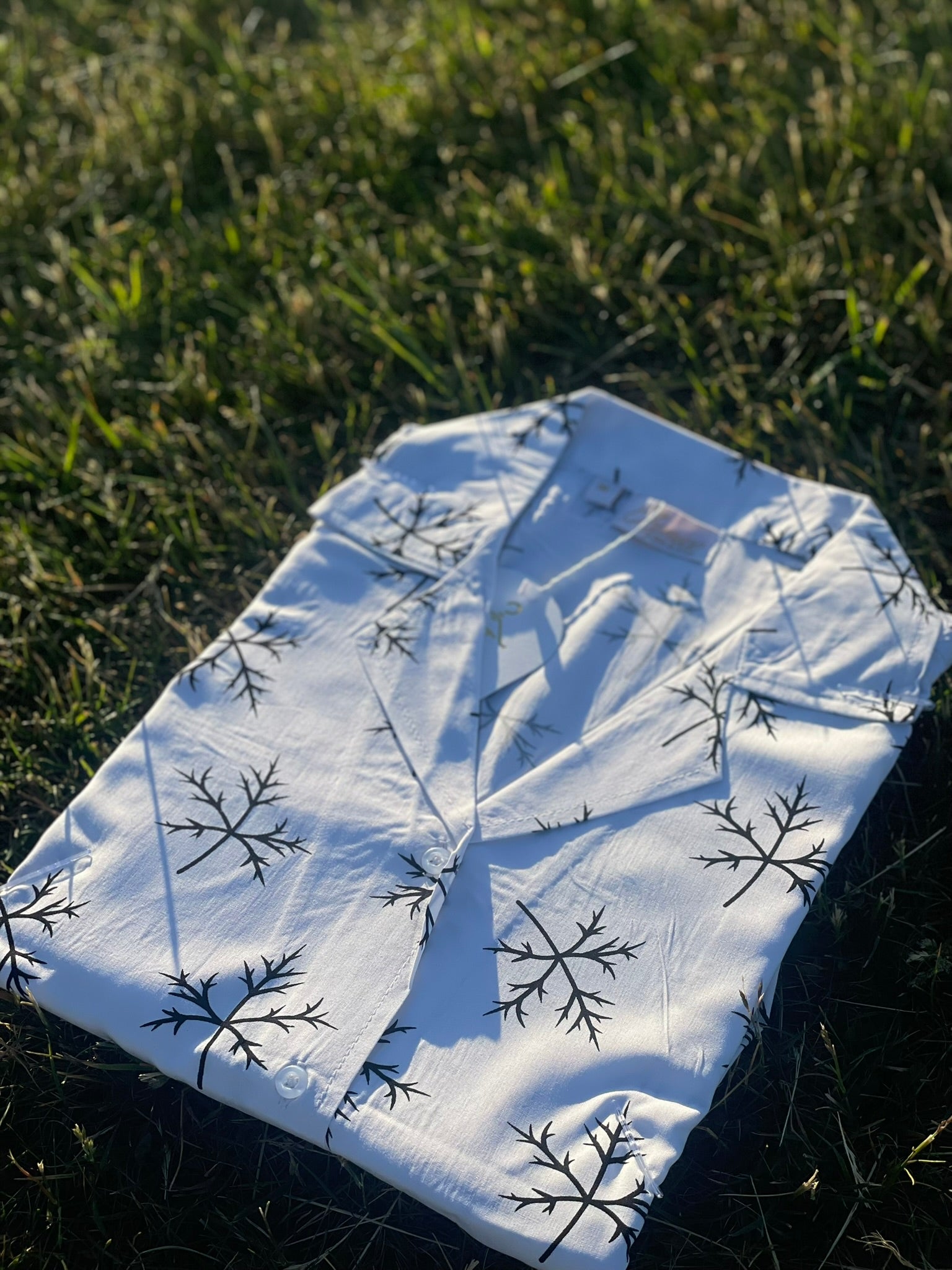 Crisp white button-up dress with black snowflake pattern – Iconico Frost by Serene Thread