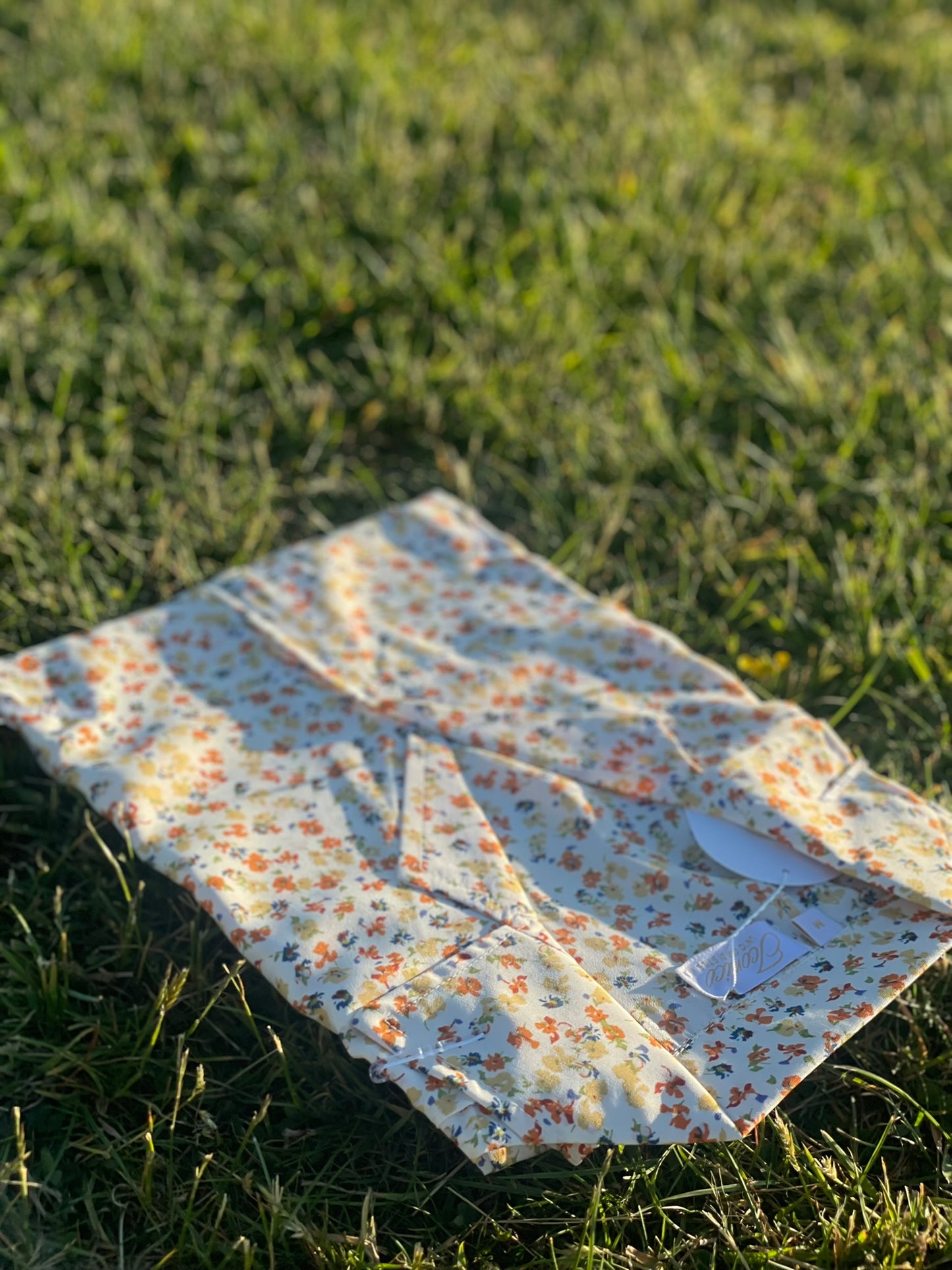 Light and fresh white linen dress with multi-colored flowers – Iconico Meadow by Serene Thread